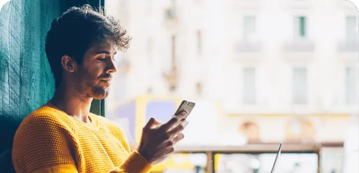 a man looking at his phone